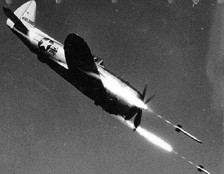 Republic_P-47D-40-RE_in_flight_firing_rockets.jpg