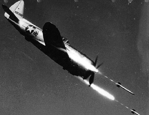 Republic_P-47D-40-RE_in_flight_firing_rockets copy.jpg